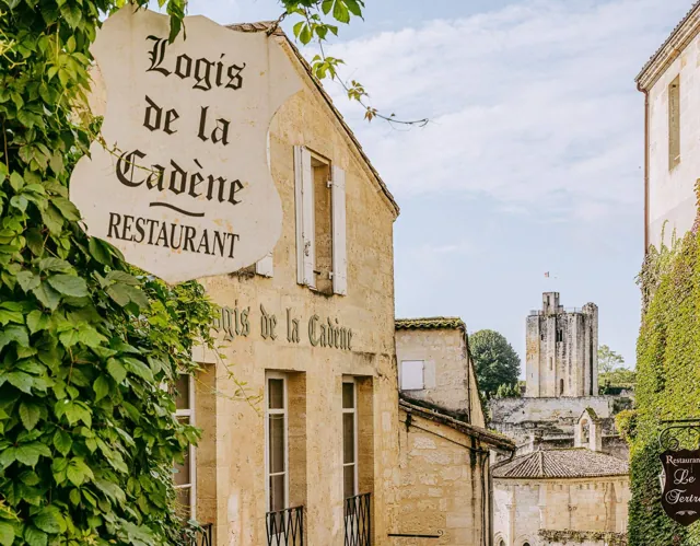 Signed entrance and exterior of Logis de la Cadene, 3 place du Marche au Bois, Saint-Emilion
